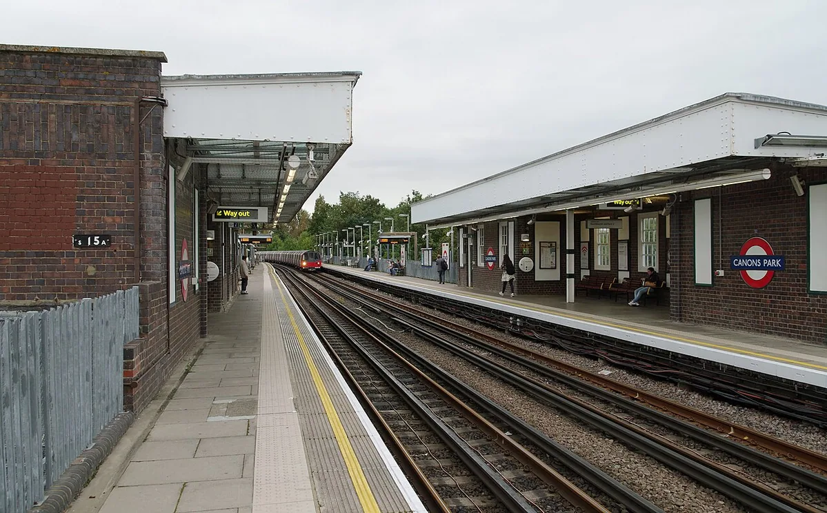 A Jubilee Line 1996 Stock train arrives at Canons Park tube station, working an eastbound service.