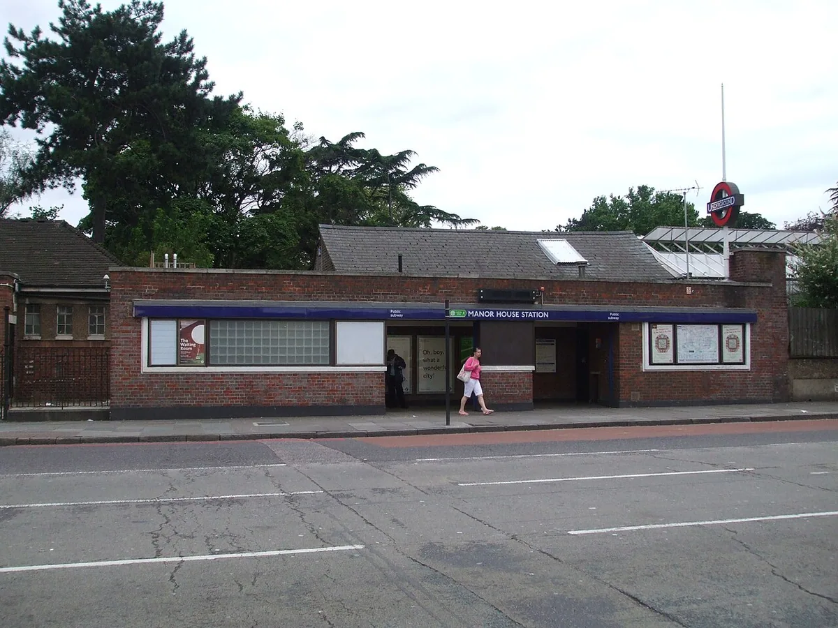 Manor house tube station main entrance, to the northwest of the A105 Green Lanes/A503 Seven Sisters Road junction. However the ticket office is below ground