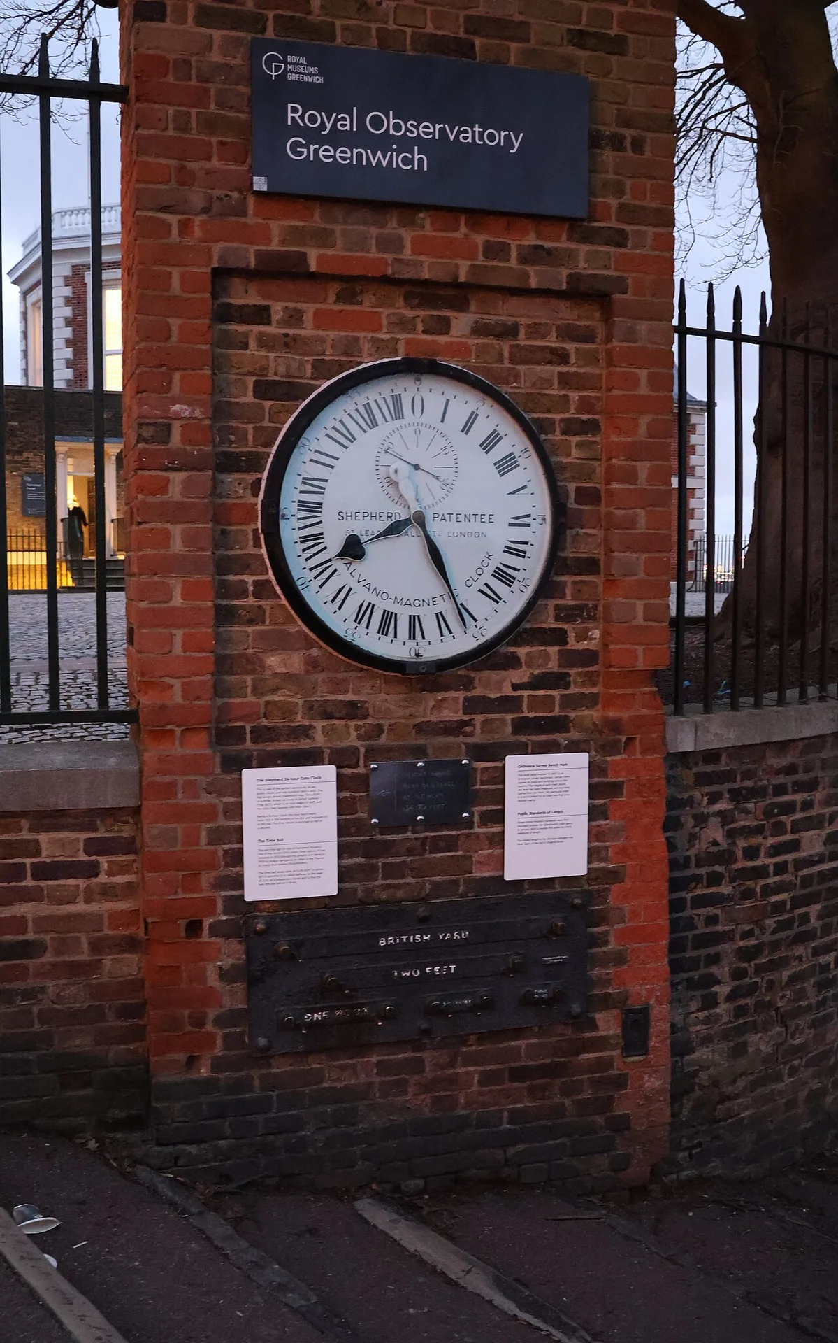 Galvano-magnetic clock showing the local time and a standard British yard below in Greenwich Park, Greenwich, London.